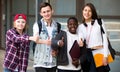 Group of teens posing outside school Royalty Free Stock Photo