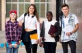 Group of teens posing outside school Royalty Free Stock Photo