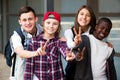 Group of teens posing outside school Royalty Free Stock Photo