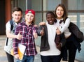 Group of teens posing outside school Royalty Free Stock Photo