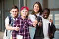 Group of teens posing outside school Royalty Free Stock Photo