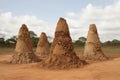 Group of termite mound nests. Generate ai Royalty Free Stock Photo