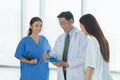 Group of Thai Asian doctors with medicine, medical team having a meeting, brainstorming conference call in hospital. Discussing Royalty Free Stock Photo