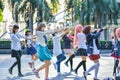 Group of Thai cosplayers dancing like cover girls for public show