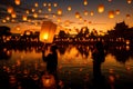 Group of Thai people release sky floating lanterns or lamp to worship Buddha\'s relics with reflection