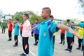 Group of Thai student are doing exercise together in the basketball field in the morning at Paknampran wittaya school Hua Hin, Th