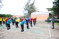 Group of Thai student are doing exercise together in the basketball field in the morning at Paknampran wittaya school Hua Hin, Th