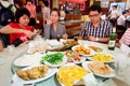 Group of Thai tourist eating Chinese food