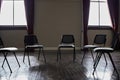 Group therapy, mental health or circle chairs in empty room, clinic or asylum building for trauma, ptsd or anxiety Royalty Free Stock Photo