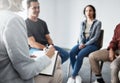 Group therapy. Therapist talking to patients together. Group of people in therapy. Diverse people talking to Royalty Free Stock Photo