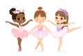 A group Of Three Ballerinas . An African American child wears a pink tutu dress and practices in dance pointe shoes