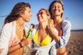 Three beautiful attractive young women having fun on the beach Royalty Free Stock Photo