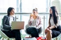 Group of three businesswomen meeting in modern office. Royalty Free Stock Photo