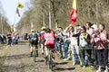 Group of Three Cyclists in the Forest of Arenberg- Paris Roubaix