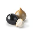 Black onion bulb and garlic clove white background Royalty Free Stock Photo