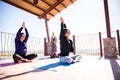 Meditating in easy yoga pose at class Royalty Free Stock Photo