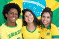 Group of three laughing brazilian soccer fans Royalty Free Stock Photo