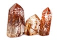 Group of three Mineral quartz rocks with rutile isolated on a white background Royalty Free Stock Photo