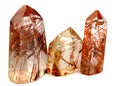 Group of three Mineral quartz rocks with rutile isolated on a white background Royalty Free Stock Photo