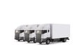 Group of three white cargo delivery trucks Royalty Free Stock Photo