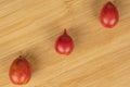 Fresh tomato de barao on light wood Royalty Free Stock Photo