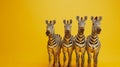 A group of three zebras standing in a row on yellow background, AI