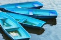 Blue Recreation Boats On The Water Royalty Free Stock Photo