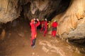 A group of tourist in a cave.