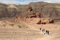 Group of Tourists approach the Screw Mountain in Timna Park. Israel