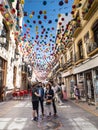 Tourists in decorated street, Ronda, Andalusia, Spain, Espana