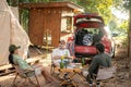 Group tourists drinking beer-alcohol and play guitar together with enjoy and happiness in Summer while camping