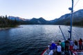 Group of tourists enjoy lake tour Royalty Free Stock Photo