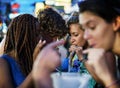 A group of tourists enjoying bucket drinks in Khao San Road