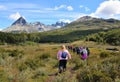 Group of tourists explore the unique peat bogs of Tierra Del Fuego National Park