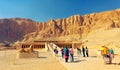 Group of tourists are going to the balustrade to the mortuary temple of Hatshepsut in Egypt