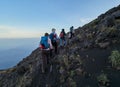 Group of tourists hiking on the Stromboli volcano in the Aeolian islands, Sicily, Italy Royalty Free Stock Photo