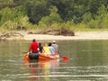 A group of tourists rafting on a mountain river on a pontoon. Tourist routes of Transcarpathia in Ukraine. Rafting on