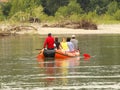 A group of tourists rafting on a mountain river on a pontoon. Tourist routes of Transcarpathia in Ukraine. Rafting on