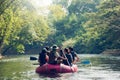 Group of tourists rafting in rubber boats on the canal in thailand Royalty Free Stock Photo