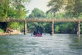 Group of tourists rafting in rubber boats on the canal in thailand Royalty Free Stock Photo