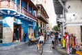 Group of tourists riding bicycles through the streets of the historic center in Cartagena de Indias