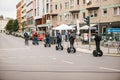 Berlin, October 3, 2017: Group of tourists riding on gyroscooters along the streets of Berlin during excursion