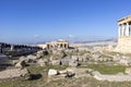 Group of tourists on the ruins of the Acropolis, view of Erechtheion with caryatids and gateway Propylaia, Athens, Greece Royalty Free Stock Photo