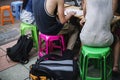 Group of tourists sitting ordering food