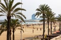 Group of tourists at Somorrostro beach in Barcelona, Spain