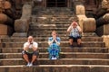 Group of tourists on the staircase of the temple.