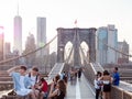 Group of tourists standing on the Brooklyn Bridge in New York City, United states. Royalty Free Stock Photo