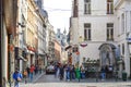 Group of tourists visiting Manneken Pis or Little Man Pee located near Grand Place in the city of Brussels, Belgium