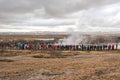 Group of tourists waiting for a geyser eruption in Iceland