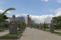 Group of tourists walking around the monument of the Middle of the World near the city of Quito